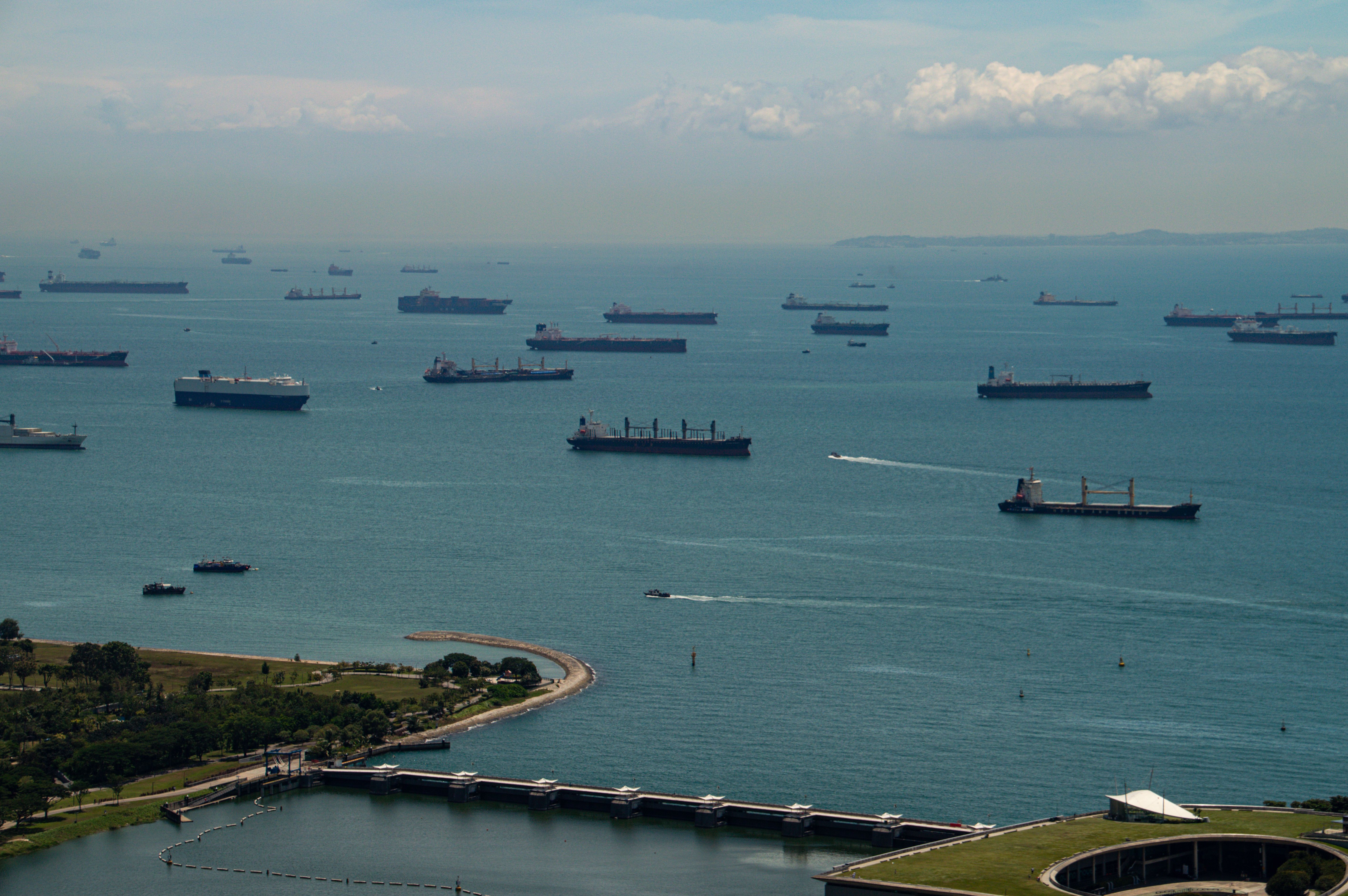 Ships anchored in the Singapore Strait, highlighting Southeast Asia's maritime trade and regional supply chains.